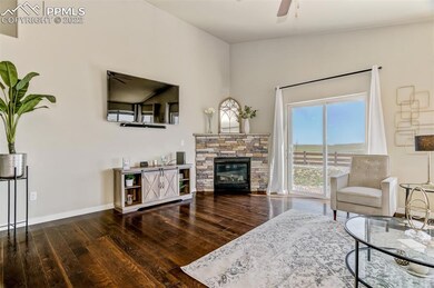 Living Room w/Gas Fireplace & Walkout (Mounted TV Stays)