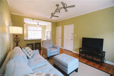 Additional view of living room looking towards the kitchen.