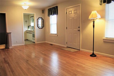 Living room showing entrance to kitchen