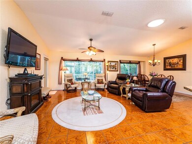 LARGE LIVING ROOM WITH VAULTED CEILINGS