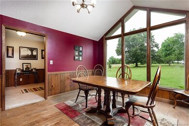 Dining room with floor to ceiling windows