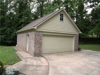 Located a few short steps from the home, the 2-car