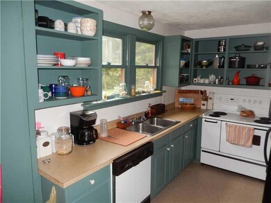 Kitchen. Kitchen overlooks backyard.