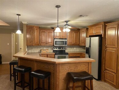 507 E Greenfield Dr, Wake Village, TX 75501 - photo 6