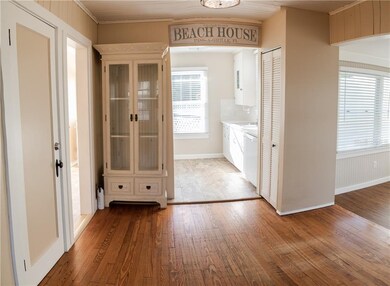 Door to Upstairs On Left and Access to Rear Foyer 