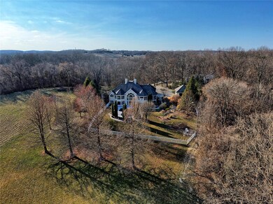 Adjoining 8 acres is to the left of subject home f