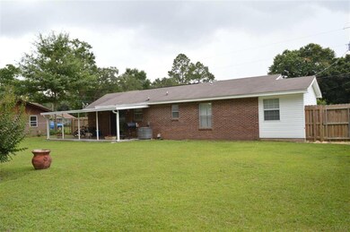 Covered back porch and plenty of room to play!