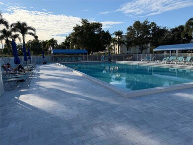 7290 Kinghurst Dr unit 306, Delray Beach, FL 33446 - photo 6