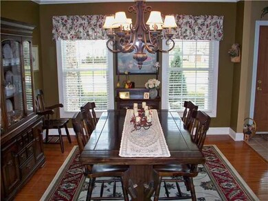 Dining Room. Open concept dining room features har