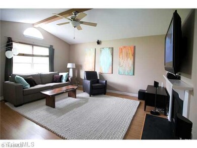 Living Room. Vaulted ceiling and fireplace