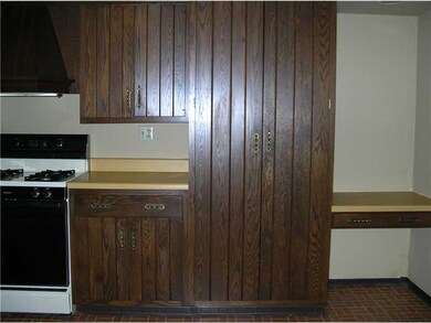 Kitchen. Cabinet matching built in pantry and desk
