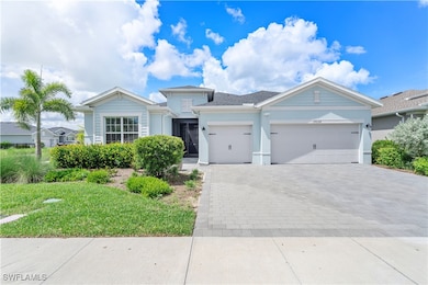 View of front of property with a garage