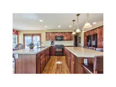 Kitchen. CHERRY CABINETRY WITH ROLL OUTS, PANTRY.