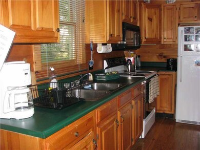 Kitchen. Which over looks Great Pond.