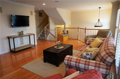 Large Living Room With Beautiful Hard Wood Floorin