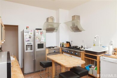 Kitchen in Upper Unit.