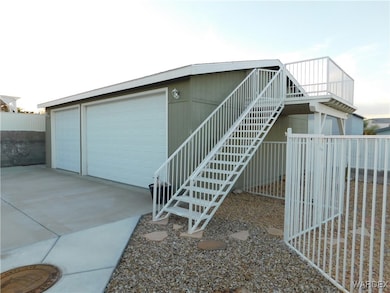 Garage features a lighted staircase to the observa