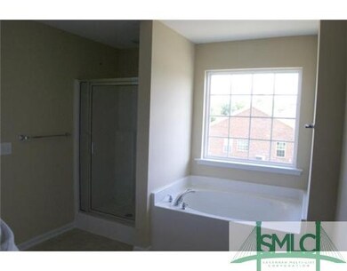 Exterior Front. Luxury owner s bath includes garde