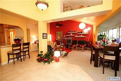 Living Room opens to Dining Room and Kitchen Count