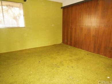 Bedroom?? Den or separate family area.  That wood 