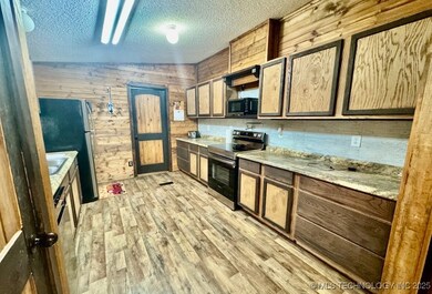 23066 Pettijohn Springs Rd, Madill, OK 73446 - photo 6