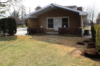 Covered Patio, off-street parking pad, and room to
