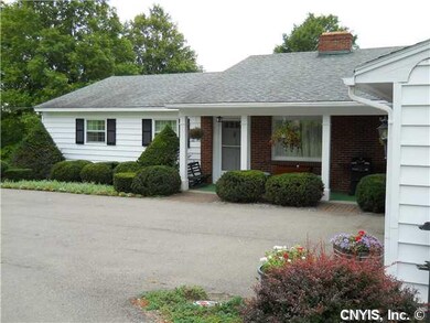 Exterior Back Driveway leads to the attached two c