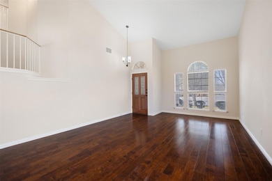 Unfurnished room with visible vents, baseboards, 