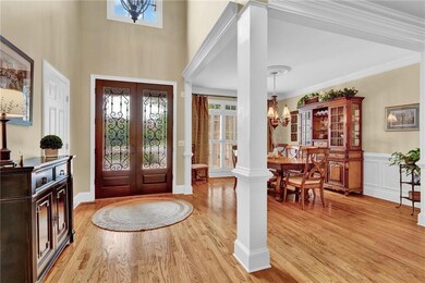 Warm hardwood flooring and classic architectural d