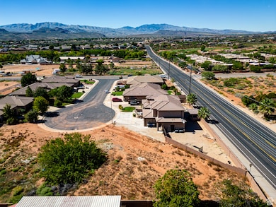 Aerial perspective of suburban area featuring a mountain backdrop