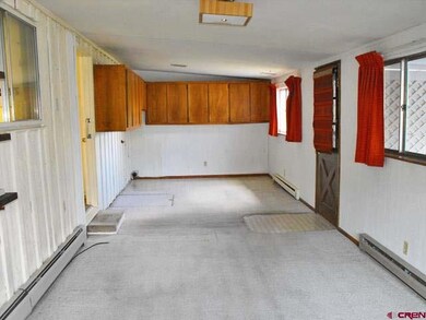 Includes washer/dryer hookups at west end