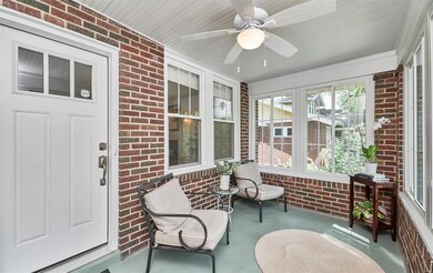 This Glassed in Porch is what greets you when you come in! This room is just as gorgeous in person as it is in this photo!