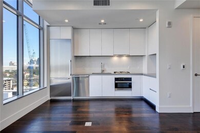 Kitchen with a sink, visible vents, a healthy amo