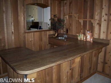 Custom bar in the Family Room with cedar woodwork.