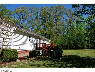 Exterior Back - FRESHLY STAINED DECK