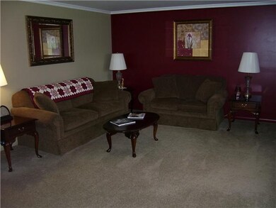 Living Room. The Front Living Room has rich wall t