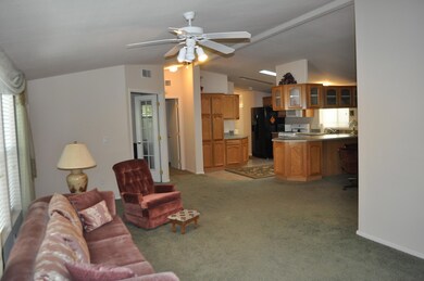 View from door to kitch b