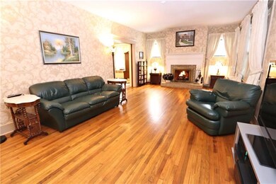 Living Room with wood burning fireplace.