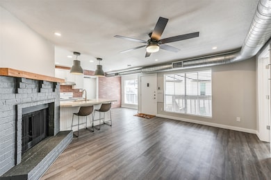 BEAUTIFULLY REMODELED UNIT ON THE 2ND LEVEL WITH OPEN FLOOR PLAN