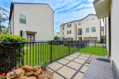 A rare find—this private side yard offers lush gre