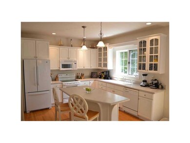 Kitchen. Decorative cabinetry and adult height isl