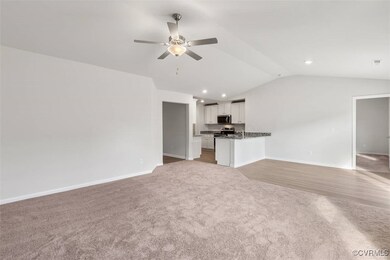 View of front of house featuring a garage and a fr