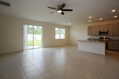 Family Room to Dinette and Kitchen View