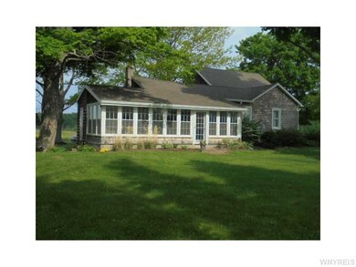Exterior Front. Side yard - Enclosed Porch