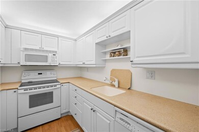 Kitchen featuring light hardwood / wood-style floo