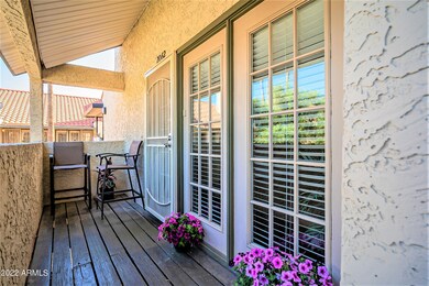 Charming Patio with Three French Windows