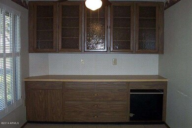 WALL OF CABINETS OFF EAT IN KIT. AREA