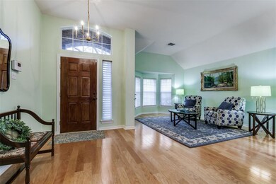 Foyer featuring hardwood / wood-style floors, loft