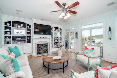 Open concept living area w/ fireplace