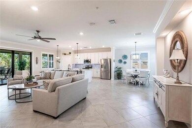 Tiled living room with ornamental molding and ceil